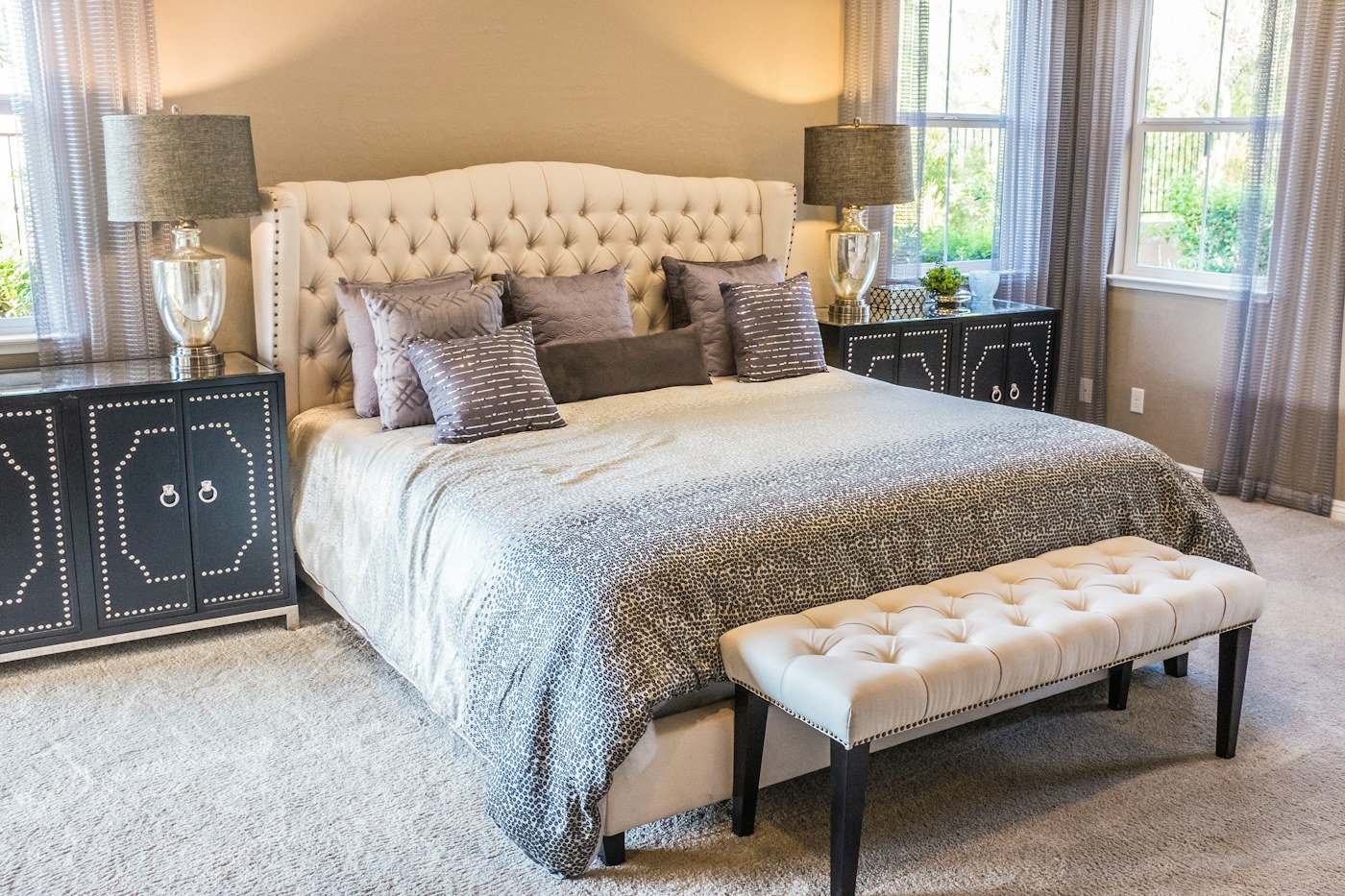 A soft bedroom with gentle layers and warm light